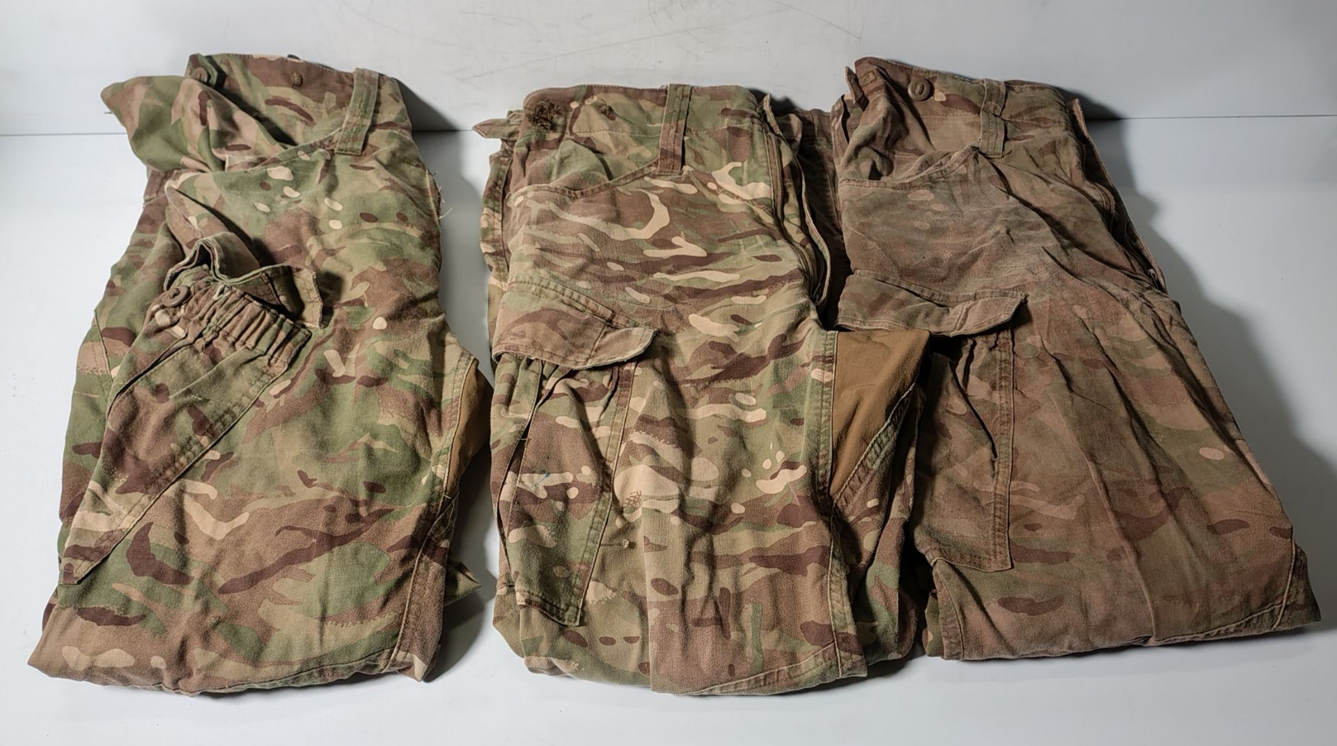 Various types of ex-military camo clothing - may include accessories - 200kg – may require repair