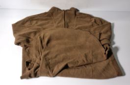 Various types of ex-military clothing - 195kg - may require repair or be as spares