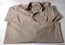 Various types of ex-military clothing - 204kg - may require repair or be as spares