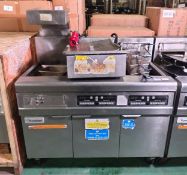 Frymaster FMRE217CSD (SN: 1301NI0005) 3 door stainless steel twin tank quad basket electric fryer