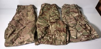 Various types of ex-military camo clothing - may include accessories - 181kg – may require repair