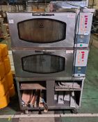 2x Mono BX FG156C-A12 stainless steel 2-shelf convection ovens on stainless steel portable base