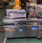 Frymaster FMRE217CSD (SN: 1301NI0031) stainless steel twin tank quad basket electric fryer