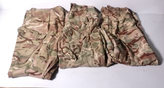 Various types of ex-military camo clothing - may include accessories - 209kg – may require repair