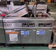 Frymaster FMRE217CSC (SN: 1807NI0032) 3 door stainless steel twin tank quad basket electric fryer