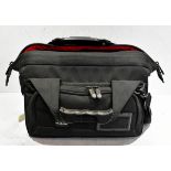 Canon EOS C100 camera with handle attachment, charger, 3 x batteries, Sachtler bag