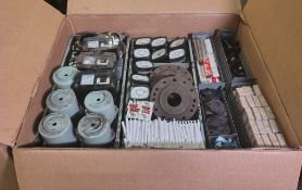 Workshop hardware and consumables in metal storage trays - heavy duty bolts, rubber seals, filters