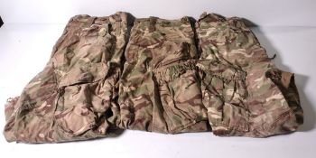 Various types of ex-military camo clothing - may include accessories - 195kg – may require repair