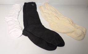 Various mixed socks - various sizes - paired & unpaired - unknown quantity - 184kg