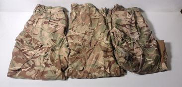 Various types of ex-military camo clothing - may include accessories - 164kg – may require repair