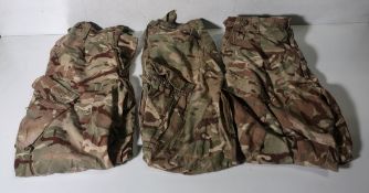 Various types of ex-military camo clothing - may include accessories - 210kg – may require repair