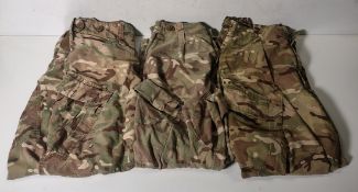 Various types of ex-military camo clothing - may include accessories - 174kg – may require repair