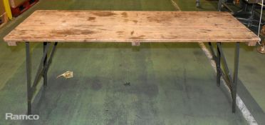 18x wooden topped tables with metal folding legs - mixed conditions