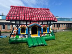Jumbo Inflatables crazy cottage bouncy castle - full details in the description