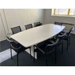 Boardroom table approx 2.4m L x 1.2m W x 0.74m H with 8x chairs