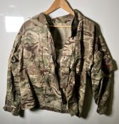 Various types of ex-military camo clothing - may include accessories - 180kg – may require repair