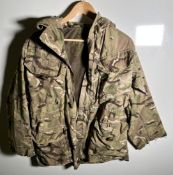 Various types of ex-military camo clothing - may include accessories - 178kg – may require repair