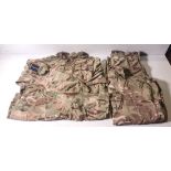 Various types of ex-military camo clothing - may include accessories - 227kg – may require repair