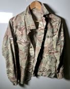 Various types of ex-military camo clothing - may include accessories - 166kg – may require repair
