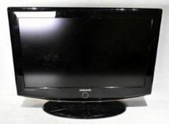 Samsung LE26R87BD 26 inch TV with stand (some scratches) in flight case - W 750 x D 270 x H 600mm