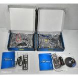 2x ASRock H67M motherboard with I/O shield, SATA cables and manuals