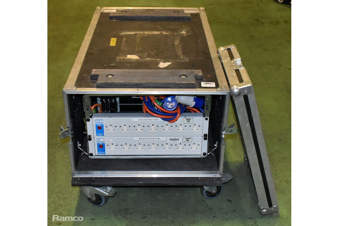 APC SURT5000XLI power supply with 2x Olson 7-IED distribution panel within wheeled flight case - Image 1 of 7