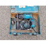 Makita HR1840 240V hammer drill in damaged carry case