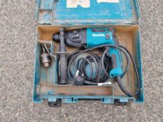 Makita HR1840 240V hammer drill in damaged carry case