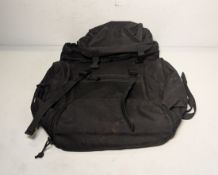 30x Field 30L black rucksacks - may be missing zipper pull tab