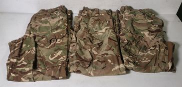 Various types of ex-military camo clothing - may include accessories - 207kg – may require repair