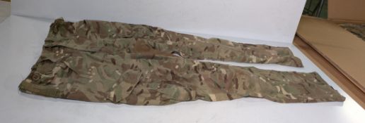 Various types of ex-military camo clothing - may include accessories - 208kg – may require repair