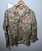 Various types of ex-military camo clothing - may include accessories - 211kg – may require repair