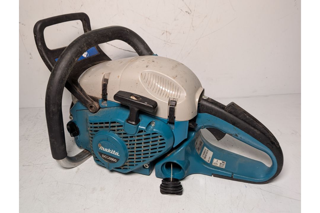 Makita DCS5000 Professional 50cc petrol chainsaw in carry case - BARE UNIT ONLY - Image 1 of 11