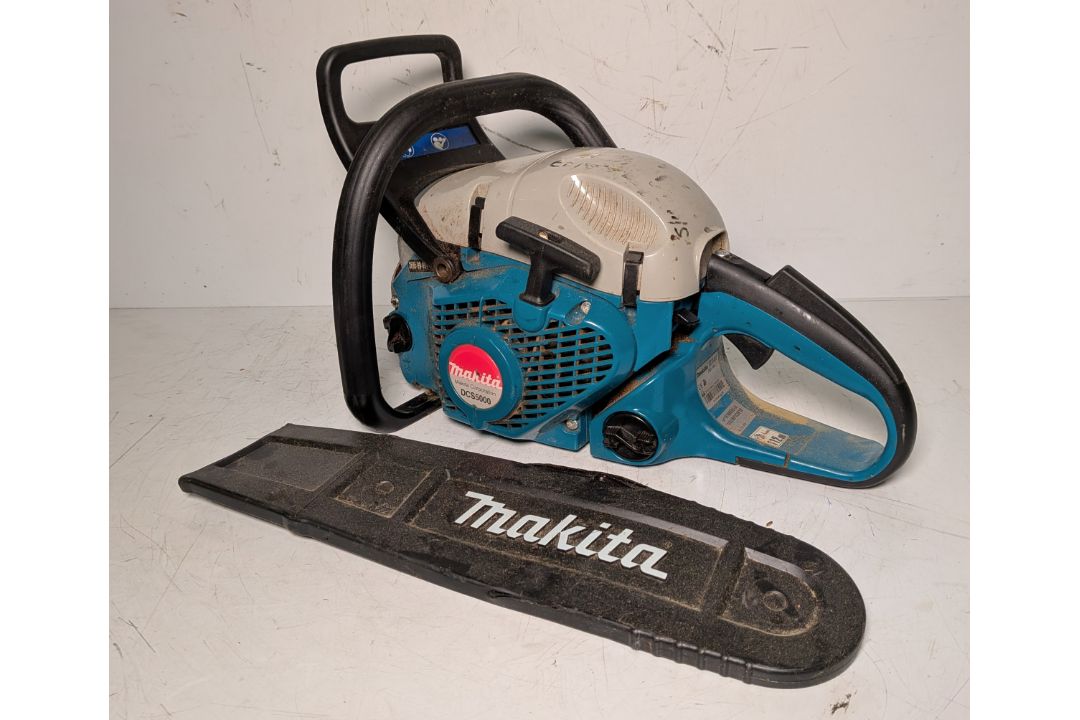 Makita DCS5000 Professional 50cc petrol chainsaw in carry case - BARE UNIT ONLY - Image 1 of 8