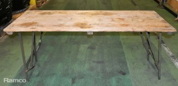 17x wooden topped tables with metal folding legs - mixed conditions