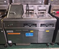 Frymaster FMRE217CSE (SN: 1510NI0033) stainless steel twin tank quad basket electric fryer with dump