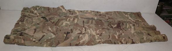 Various types of ex-military camo clothing - may include accessories - 187kg – may require repair