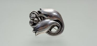 A Georg Jensen Danish sterling silver planished h. x 4cm l. x 4.5cm 13.03g floral berry brooch