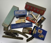 Dublo railway accessories; a signal cabin, level crossing, railway bridge, quantity of track etc.