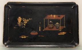 A Japanese lacquer tray, Meiji period, c. 1900, rectangular, decorated with a table supporting