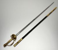 A Victoria Court sword, the gilded hilt with plumed helmet pommel, guard and hilt, on etched blade