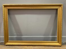 A Victorian giltwood picture frame: Opening H. 50cm L. 76cm