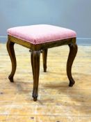 A late 19thc rosewood stool with plain frieze raised on plain scroll cabriole supports,