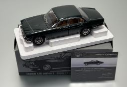 A Paragon 1/18 scale replica model of a 1971 Jaguar XJ6 Series 1 - 4.2 British Racing Green, with