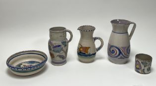 A collection of Honiton earthenware comprising, a pitcher with handle to side decorated with a