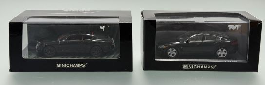 A Minichamps Bentley Continental Supersports 2009 black 1/43 model car together with a Minichamps
