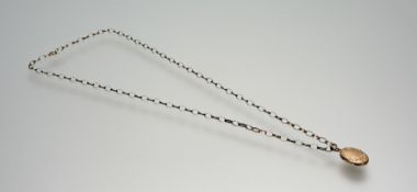 A 9ct gold belcher style link chain necklace with ring fastening: l. x 30cm and a 9ct gold front and
