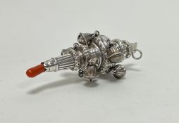 A Victorian Birmingham silver baby teething rattle and whistle with pink cotal tip: l. x 12cm