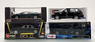 A collection of 1/18 scale model cars comprising, a Maisto Jaguar XJ220, a Maisto Jaguar XJ220 (