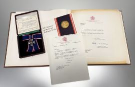 Royal Victorian Order, 5th class, silver and enamel No. L172 in Collingwood case of issue, Mrs